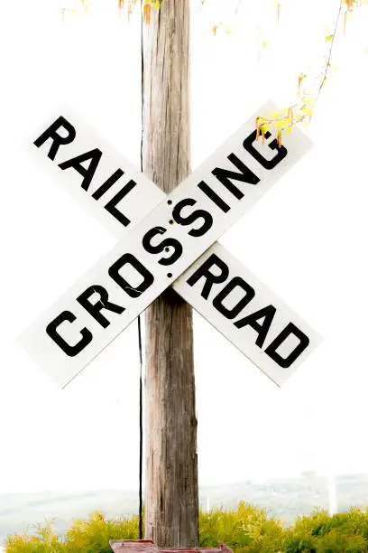 a picture of a railroad crossing sign