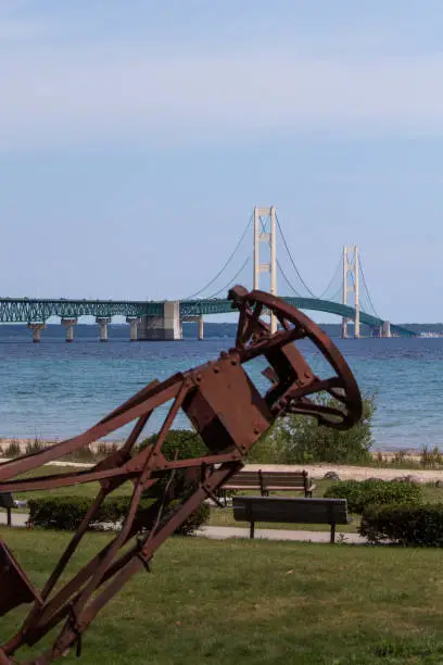 Looking at the Mackinac Bridge from one of many parks in Mackinaw City.  Looking past a buoy on display.