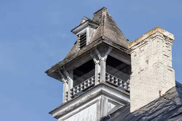 Copula on abandoned building.