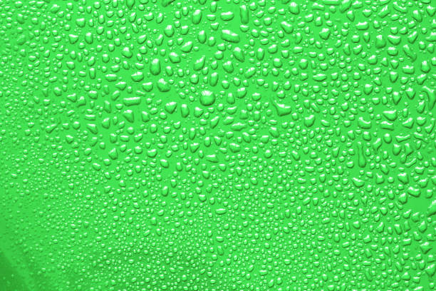 istock The Abstract water drop on surface of  fresh green background 849668154