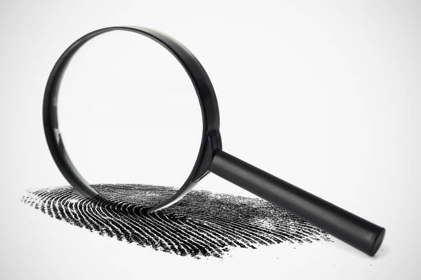 istock Magnifying glass with fingerprint 849672706