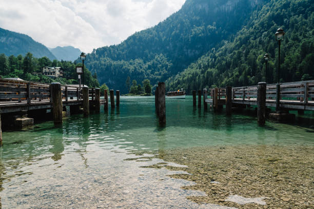 istock Pier in Konigssee lake a sunny summer day 849679926