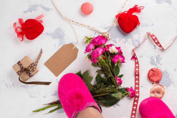 I hate Valentines day concept I hate Valentines day concept. After party mess with flowers, gift box, cookies and decorative hearts. Top view. Space for text valentinstag stock pictures, royalty-free photos & images