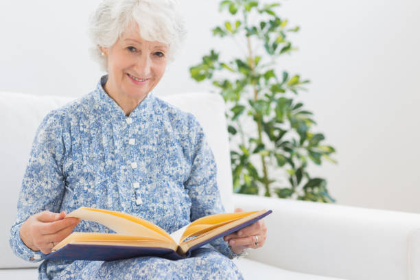 istock Elderly woman watching pictures 849696568