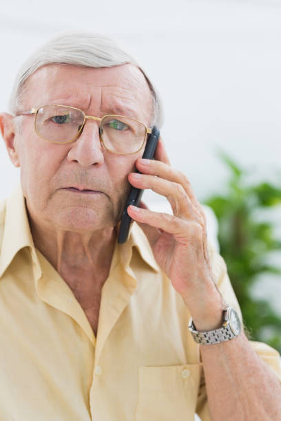 istock Unhappy elderly man on the mobile phone 849699182
