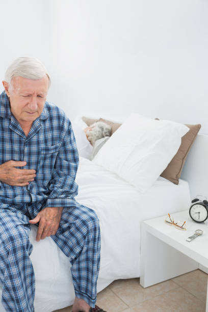istock Old man suffering with belly pain 849699700