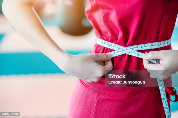 Girl Waist Measurement Stock Photo - Download Image Now - Adult, Adults Only, Arts Culture and Entertainment