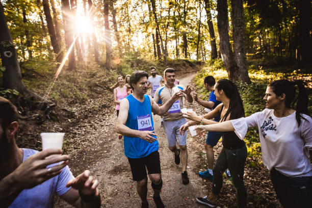 istock Group of athletes refreshing themselves during marathon race. 849707998