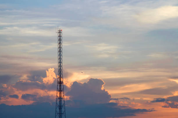 istock Mobile phone communication tower transmission  signal  leash in evening sky 849708248