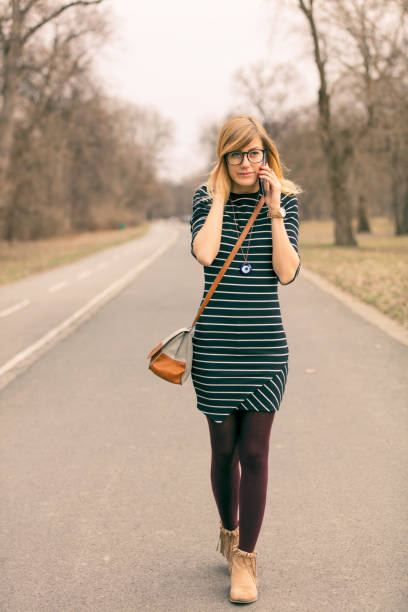 istock Attractive cute girl talking on her cellphone. 849716700
