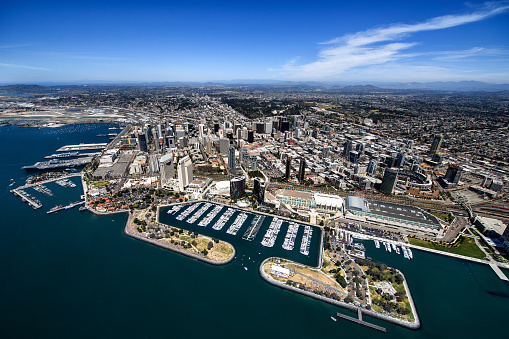 Helicopter point of view of San Diego, USA. USS Midway Museum and Embarcadero Marina Park are visible in the image.