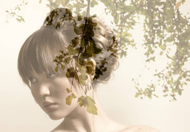 istock Double exposure of beautiful bride and green leaves 849726652