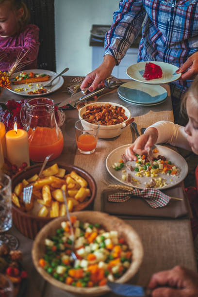 istock Family Having Traditional Holiday Stuffed Turkey Dinner 849740990