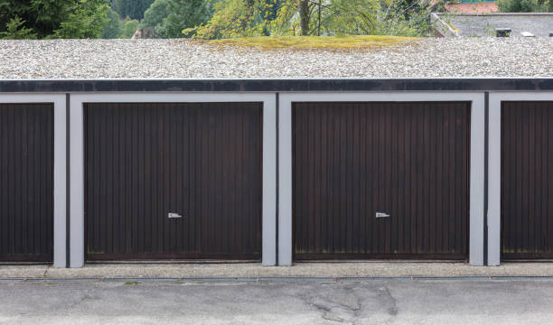 istock Old brown door of a garage 849745694