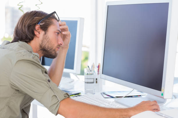 istock Graphic artist looking at his screen 849748262
