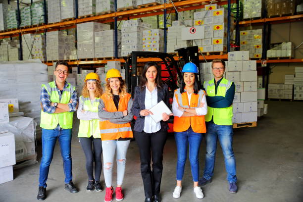 istock Group portrait of staff at distribution warehouse 849757134