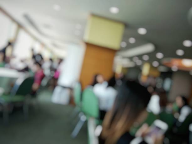 istock blurred of people in room,defocus for background 849757634