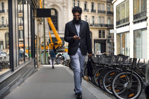 istock Pakistani man walking to work in the city 849763772