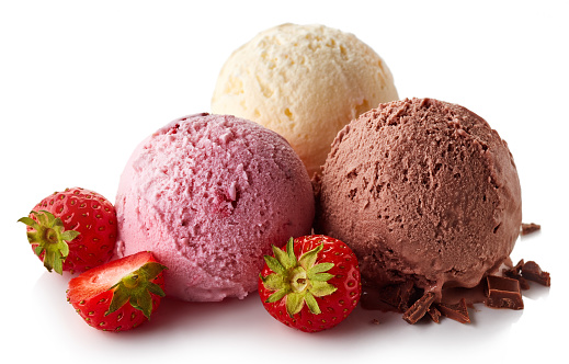 Three various colorful ice cream balls - strawberry, vanilla and chocolate isolated on white background