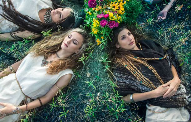 istock Two women lying in the grass 849784376