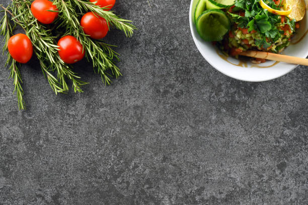 istock vegetables and fruits on stone background 849790776