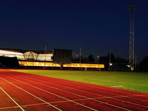 トラック&フィールド - sports track track and field stadium sport night ストックフォトと画像