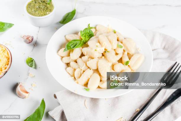 Ready To Eat Potato Gnocchi Stock Photo - Download Image Now - Above, Backgrounds, Basil