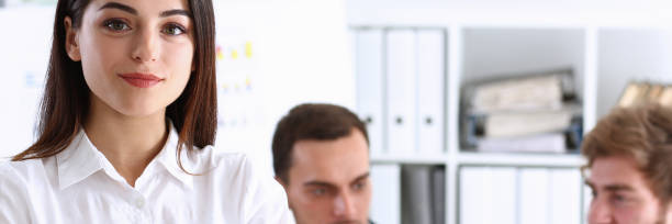 istock Beautiful smiling cheerful girl at workplace look in camera 849802638