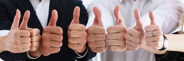 istock Group of people show OK or confirm with thumb up 849802666