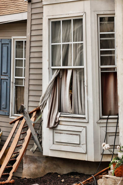 istock Wooden house damaged by disaster. 849823006