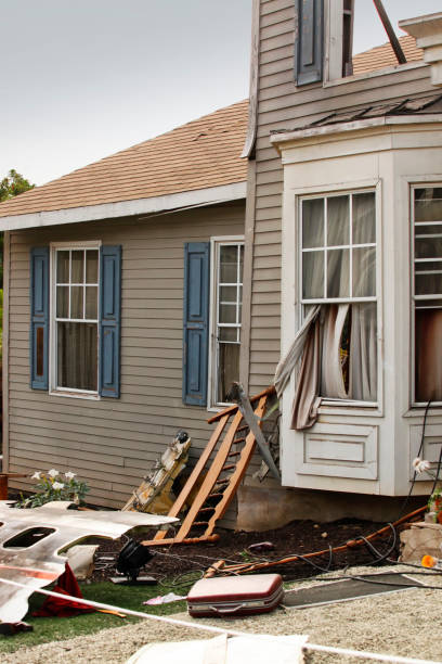 istock Wooden house damaged by disaster. 849823016
