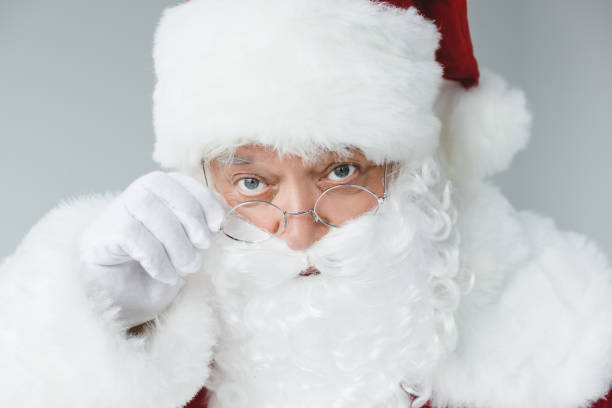 istock bearded santa claus in eyeglasses 849829906