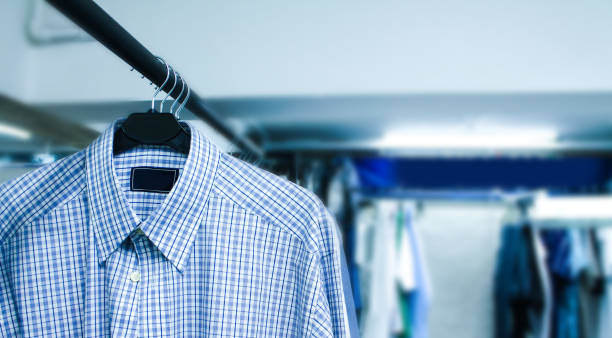 istock Dry cleaning things hanging in a row 849833038