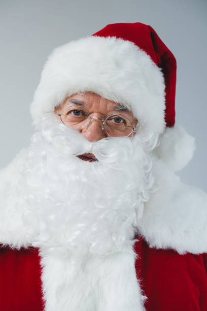 istock santa claus in hat and eyeglasses 849838192