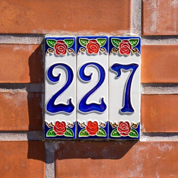 Number 227 ceramic house number two hundred and twenty seven on three tiles ceramic tile house numbers stock pictures, royalty-free photos & images