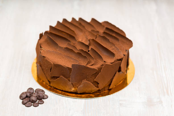 istock The chocolate cake on the table without spoons 849841940