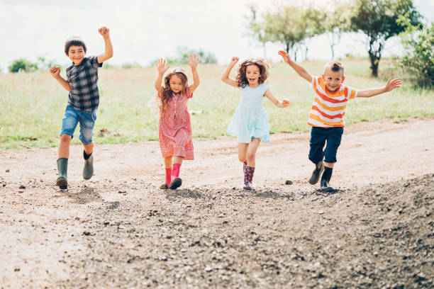 istock Happy farm children outdoors in the summer 849842648