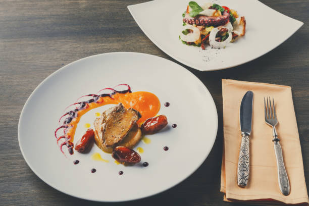 istock Roasted goose liver with date fruit and apple 849845518