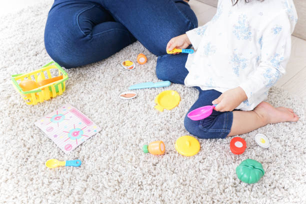 istock Child playing with toy 849846956
