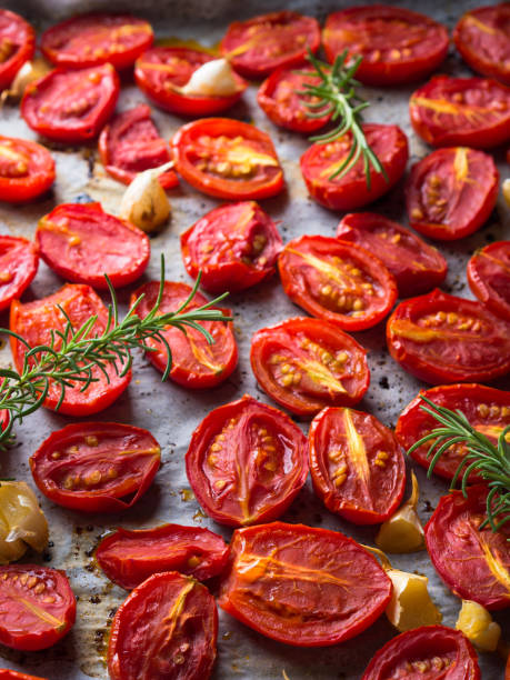 istock Red heirloom tomatoes baked with garlic 849847226