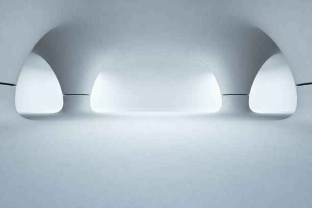 Abstract interior design of modern showroom with empty white floor and smooth concrete wall background, Future architecture or alien house