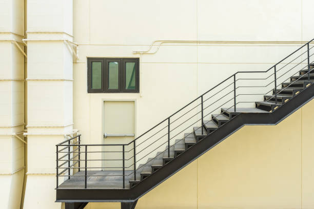 istock stair for fire escape with the steel railing and ladder 849851100