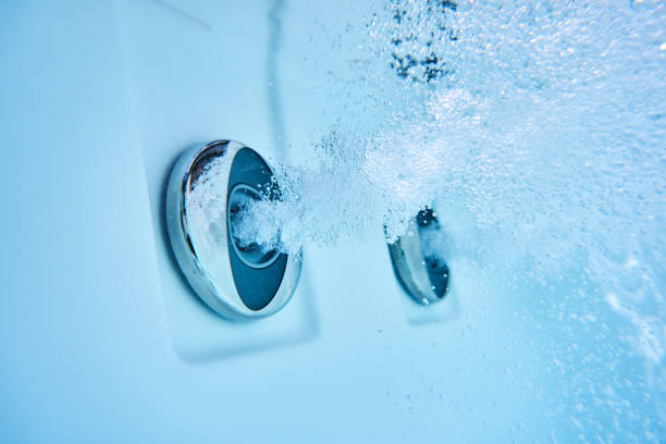 water stream of massage jets in hot tub closeup