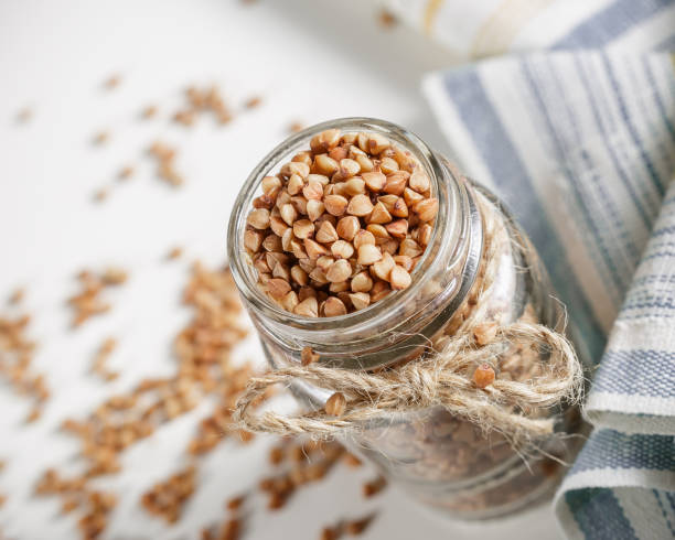 istock Uncooked buckwheat in glass jar close up 849861882