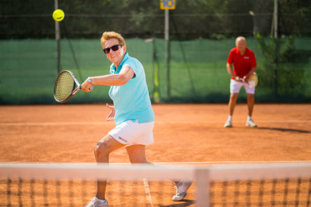 istock Seniors Taking on the World - tennis double 849864150