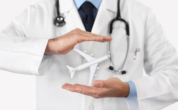 medical tourism healthcare travel insurance concept medical tourism healthcare travel insurance concept plane hand tool photos stock pictures, royalty-free photos & images