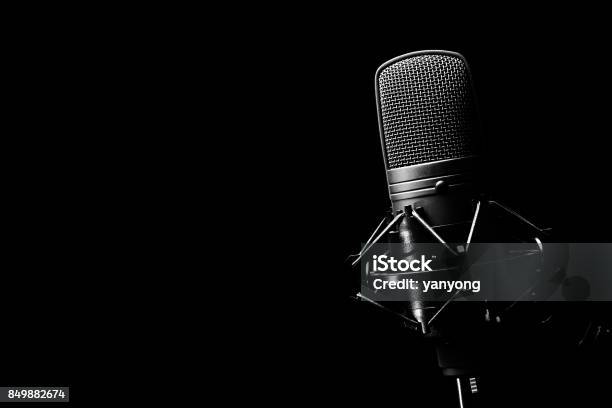 Studio Condenser Microphone Isolated On Black Copy Space On Left Stock Photo - Download Image Now