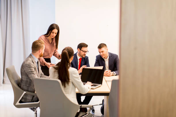 istock Team of young colleagues working together in an office 849897258