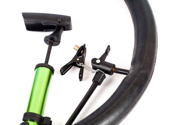 istock pumping air into bike tire 849897878
