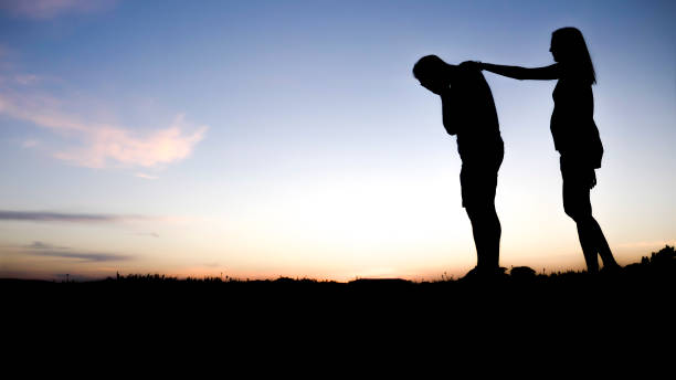 istock Sad young man silhouette worried at sunset 849901036